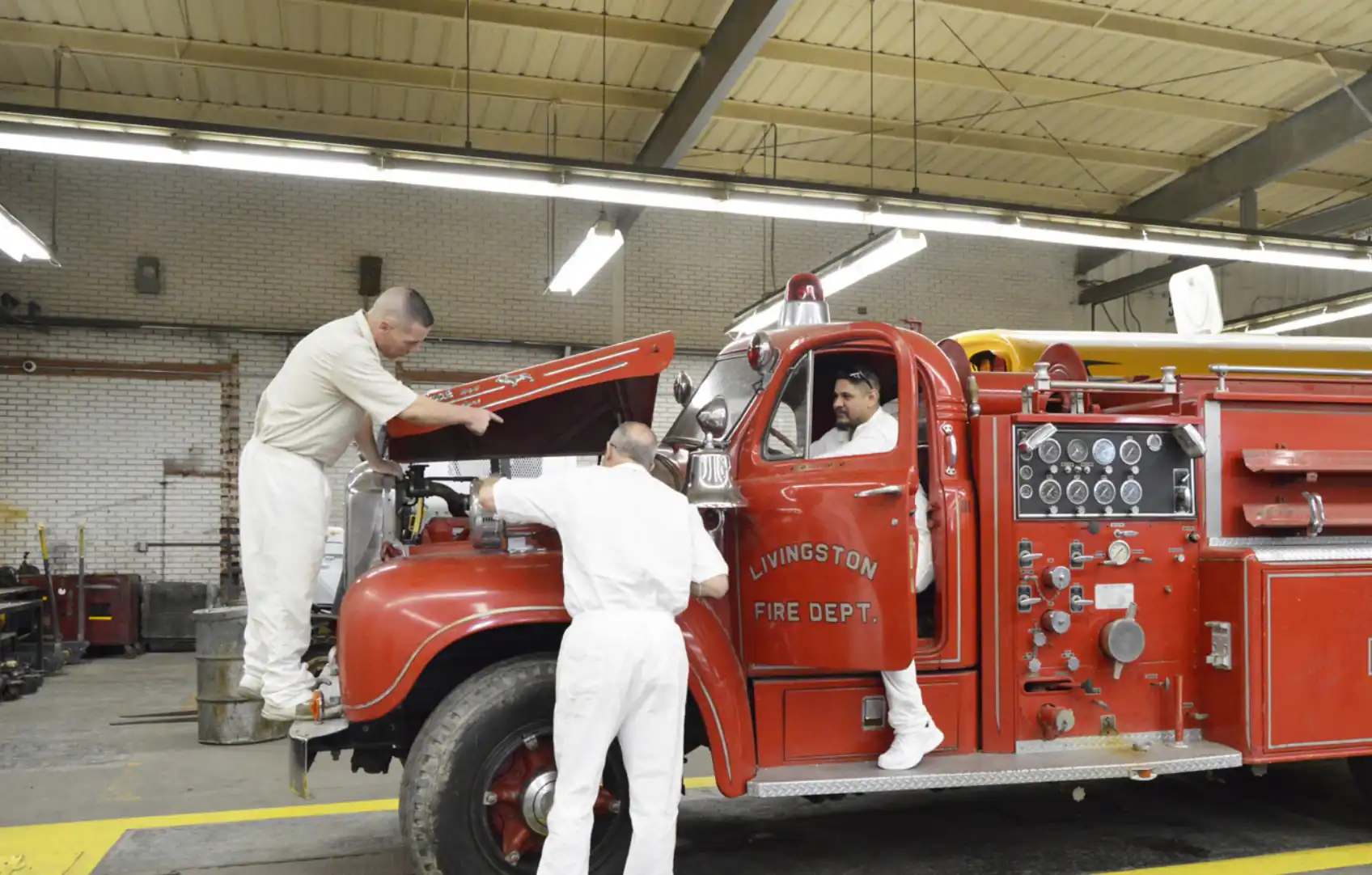 firetruck with repair personnel